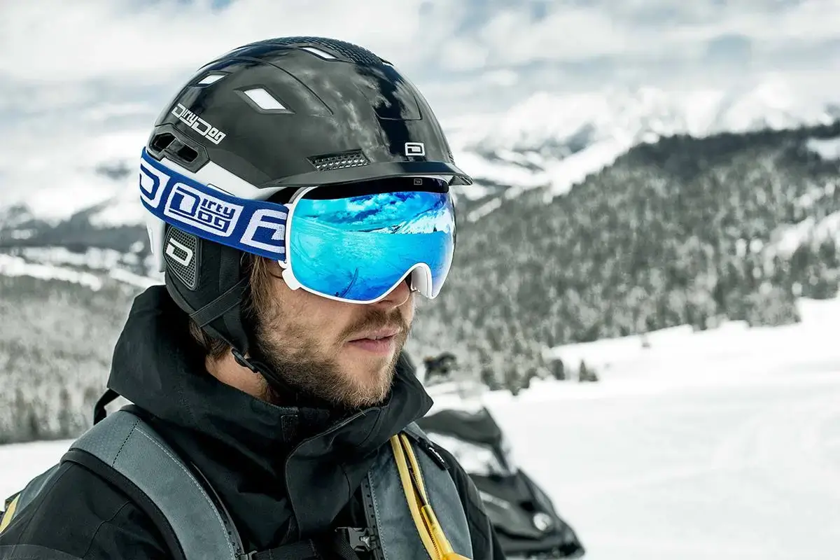 Man wearing snow goggles on a mountain